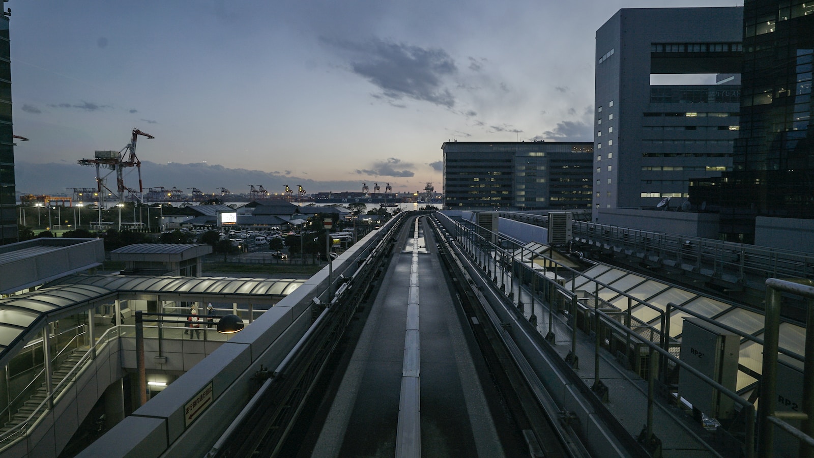 a highway with buildings on either side